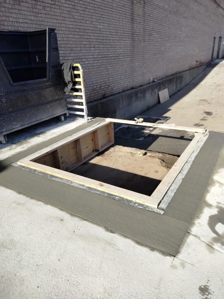 A concrete slab with a hole in it