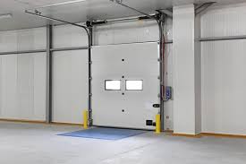 A garage door that is open and has no one inside.